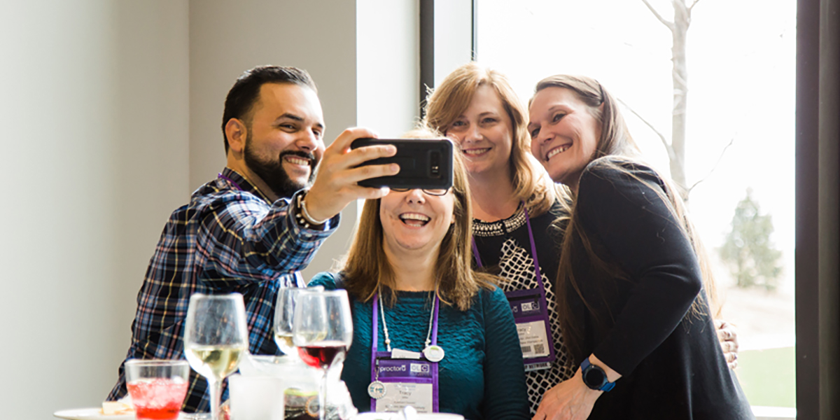 Innovate conference attendees taking a selfie together